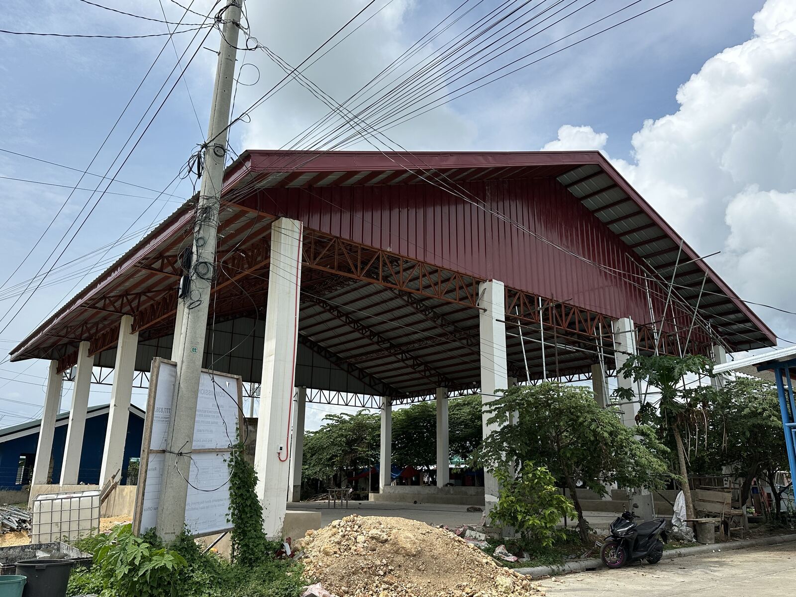 Completed covered structure with steel roofing